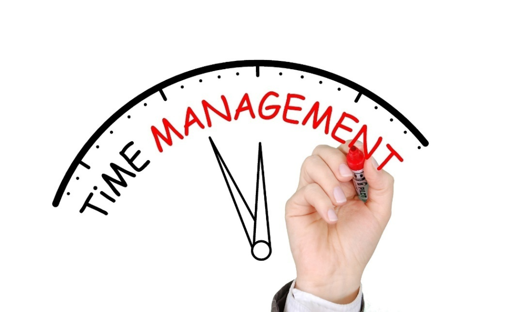 A person writing time management